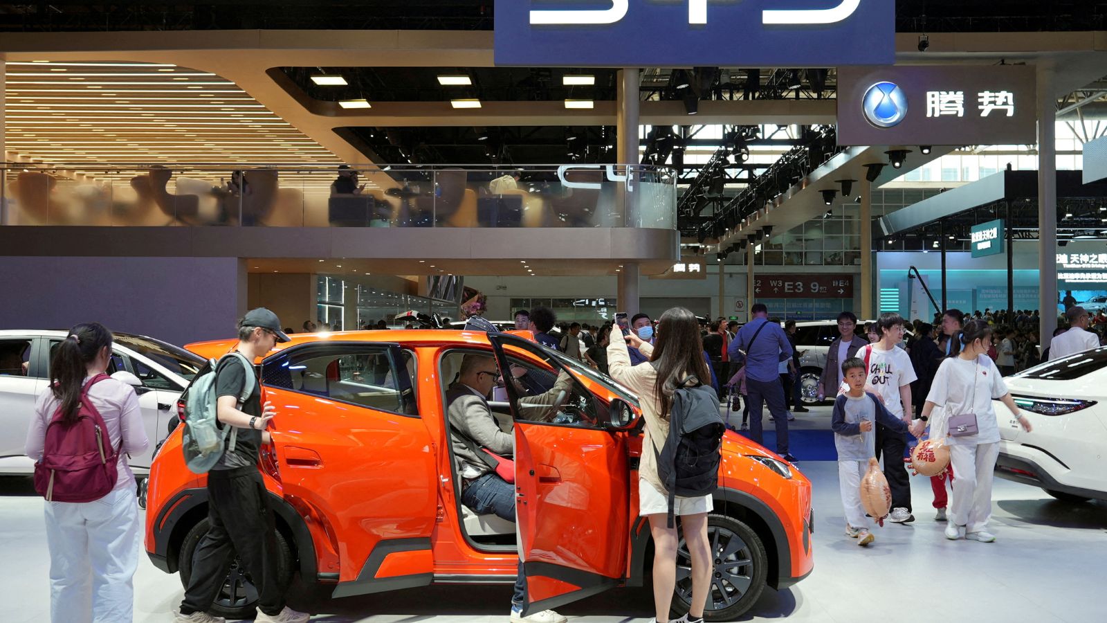 High oil prices fuel surge in Chinese EV sales, but charging networks lag