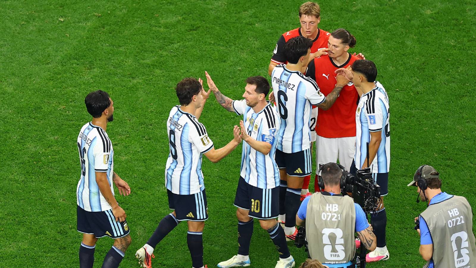 Messi makes World Cup history as Argentina secure knockout spot