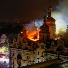 Russian attack sets fire to centuries-old religious site in Kyiv and kills 5 in Kharkiv