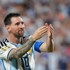 Messi hat-trick powers Argentina past Algeria and into the record books