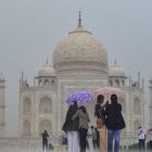 Tourists gather amid heavy rain as monsoon brings its signature charm