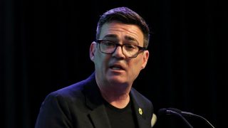 Andy Burnham distanced himself from UK Prime Minister Starmer, but may be stuck with his policies